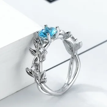 Huitan Klasik Nişan Yüzüğü Kadınlar İçin Sarma Bitki Tasarım İle Gökyüzü Mavi Kübik Zirkon Düğün Band Gümüş Kaplama Parmak Yüzük